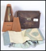 A Masonic leather satchel marked for Brother Burton Southwell Lodge NO 1405 together with a mid