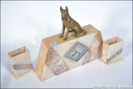 A 1930's French Art Deco marble clock garniture. The 8 day clock movement in marble case with