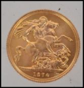 Coins. An Elizabeth II gold Sovereign, 1974.
