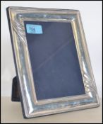A silver hallmarked picture frame  having baize li