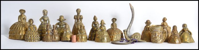 A collection of vintage 20th century crinoline ladies brass bells please see images. Most measure