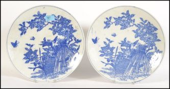 A pair of Chinese blue and white wall chargers dat
