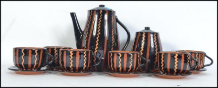 A retro 20th century six person Russian made coffee service consisting of six cups and saucers,
