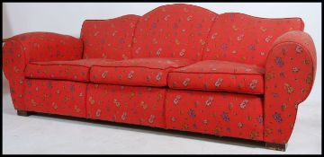 A stunning 1930's Art Deco club 3 seat sofa settee. Of French origin, the large sofa with stunning