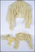 A collection of early 20th century ladies clothes.  Lacework / crochet pieces to include ivory