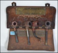 2 vintage 20th century pipe stands ' Smoke And Be Happy' together with pipes to include Oxford