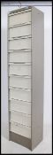 A large French 20th century Industrial unusual tall metal stationary index cabinet having grey