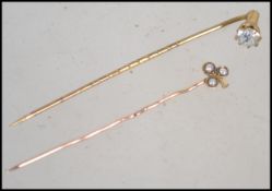 Two late 19th century / early 20th century hat pin