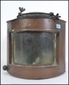 A copper ship's lamp 'starboard' with maker's label 'Telford, Grier & Mackay and Co., Glasgow'.