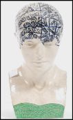 A 20th century china Phrenology head having sectio