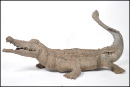 A 20th century large bronze crocodile statue study
