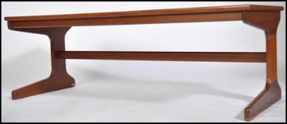 A 1970's retro teak wood pedestal coffee table rai