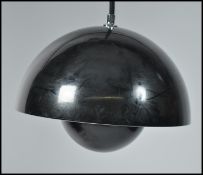 A contemporary flower pot pendant lamp in black by
