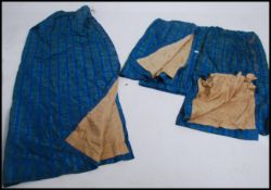 A set of 5 1970's original curtains in a blue and