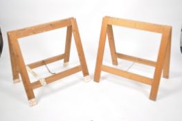 A set of vintage mid century Industrial wooden tre