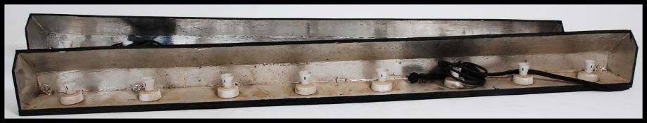 A long mid century vintage wooden theatre - stage