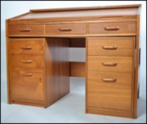 A 1970's Retro Danish teak wood roll top tambour d