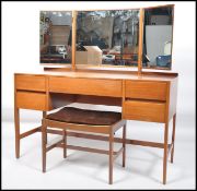 A 1960's mid century teak dressing table by Loughb