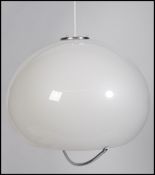 A retro 20th century Harvey Guzzini of Italy milk