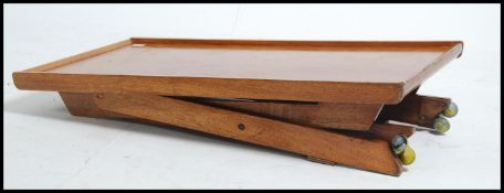 A retro 1960's folding teak wood coffee table / bu