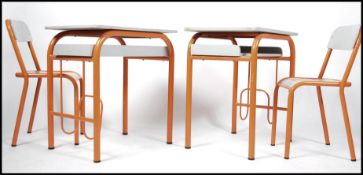 A pair of French vintage school desks with matchin