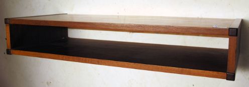 A 1960's Tapley SL modular teak wood wall mounted