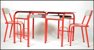 A pair of French vintage school desks with matchin