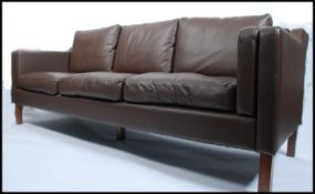 A stunning 1970's style brown leather large three