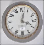 A mid century shabby chic station wall clock with