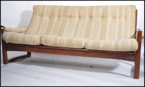 An early 1960's Guy Rogers 'Manhattan style ' teak