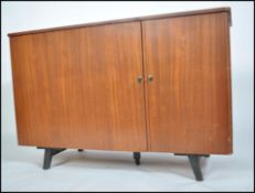 A 1970's retro teak wood metamorphic sideboard des