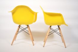 A set of 2 contemporary Eames style DAR dining cha