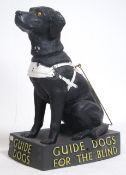 A vintage 20th century / retro  guide dogs for the