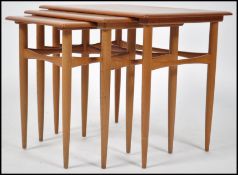 A good Danish teak wood nest of table - mid centur