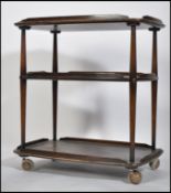 A 20th cenutry Ercol Windsor dark elm and beech wo