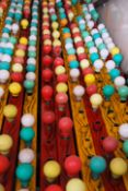 A set of 4 vintage fairground multi-coloured retro
