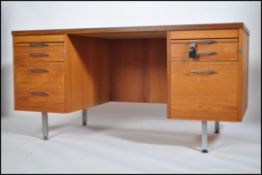 A very good quality 1970's teak and chrome twin pe