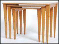 A 1960's Gordon Russell of Broadway walnut nest of