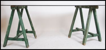 An 20th century upcycled Industrial trestle desk.