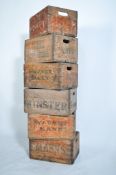 A stack of vintage mid century wooden beer - pub b