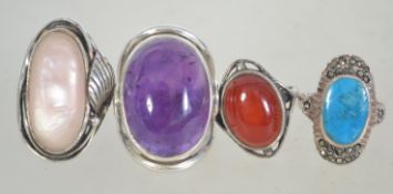 A group of 4 silver oversized ladies dre