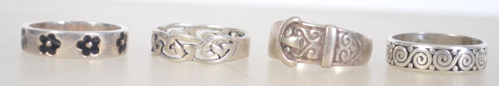 A group of 4 silver 925 band rings to in