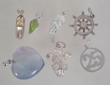 A collection of silver 925 necklace pend