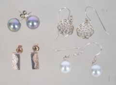 A group of 4 silver 925 pairs of earring