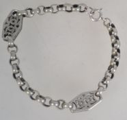A silver 925 rolo linked bracelet with f