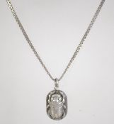 A silver white metal Egyptian scarab bee