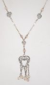 A silver 925 filigree heart drop pendant