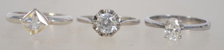 A group of three silver rings each with