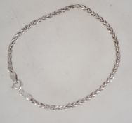 A silver rope linked bracelet / bangle w