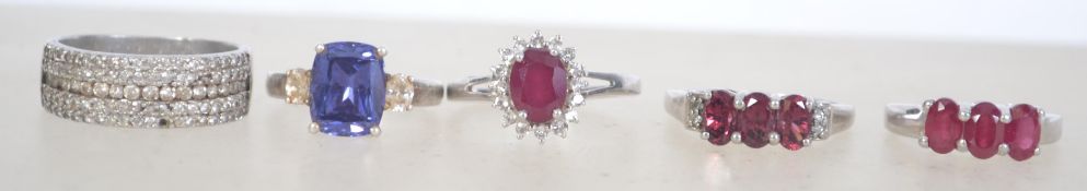 A group of 5 silver 925 dress rings to i